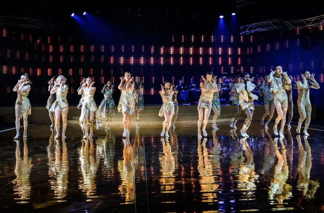 kaunas zoo and aura dance perfomance photos with beautiful dancers all wearing gold